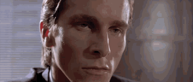 Patrick Bateman Stare GIF - Patrick Bateman Stare Card Scene - Discover &  Share GIFs