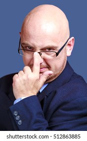 bold-headed-guy-glasses-looking-260nw-512863885.jpg